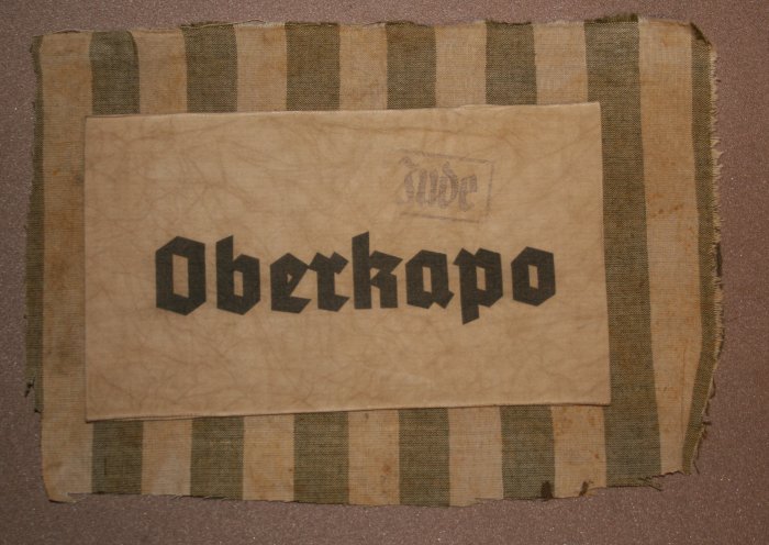 Uniform label of a Jewish oberkapo in a concentration camp