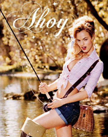 An attractive young woman fishing