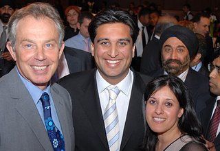 Tony Lit and his wife with Labour leader Tony Blair