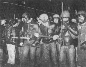 Communists (‘Reds’) with helmets and clubs preparing to launch an ‘anti-racist’ attack. Photograph taken from an old British nationalist publication.