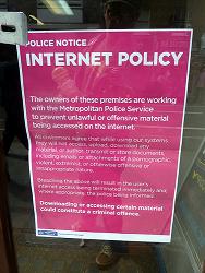 A notice on the door of a London internet cafe