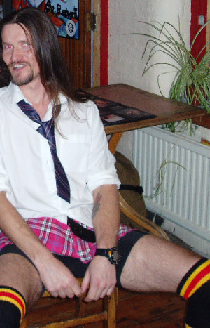 PC Mark Kennedy in a mini-skirt, a photo no doubt released by his betrayed girlfriend