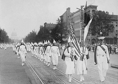 Women KKK members march in early America