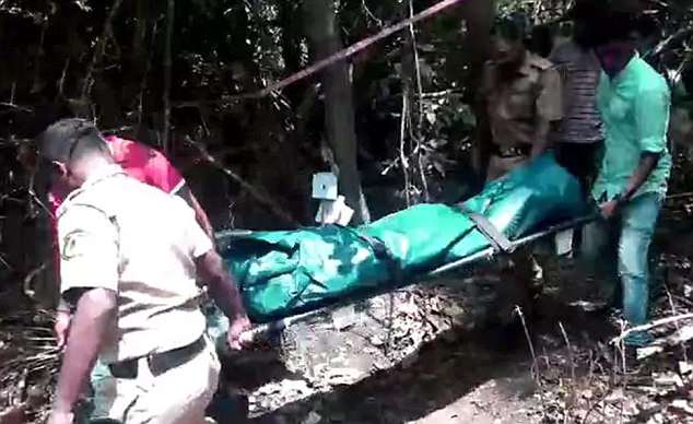 Liga Skromane's body being removed